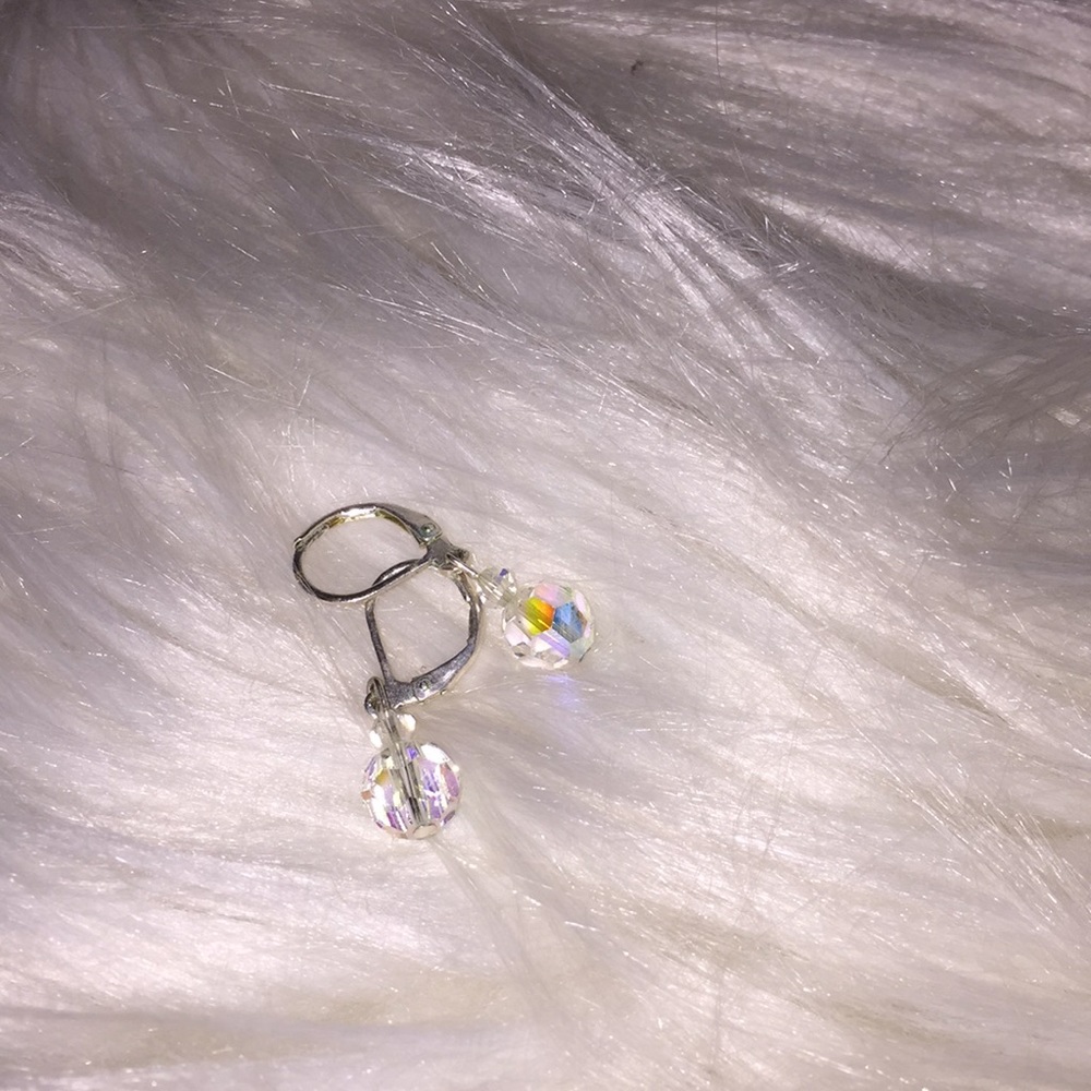 Silver and clear earrings.